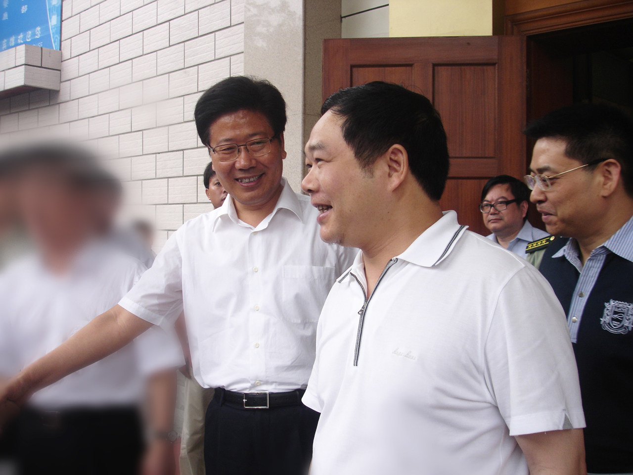 1584690497411943.jpg 2009年6月,中央政治局委员,时任湖南省书记张春贤接见董事长李建炜.jpg